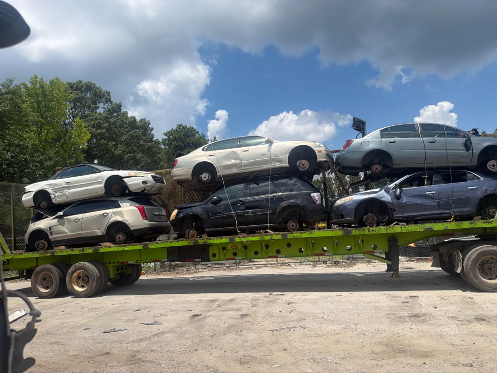 Extreme Cash transporter loaded with junk cars bought across Atlanta, GA